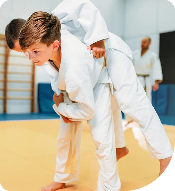Two young students practicing judo