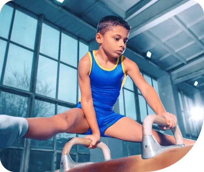 A young gymnast on the pommel horse