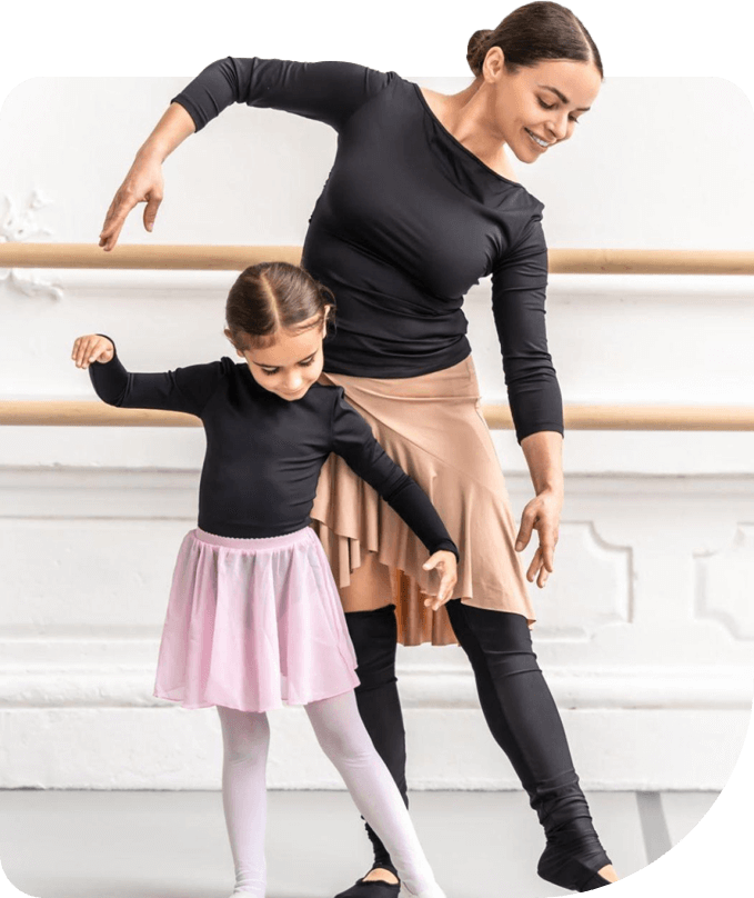 Little Girl Learning Ballet with Teacher